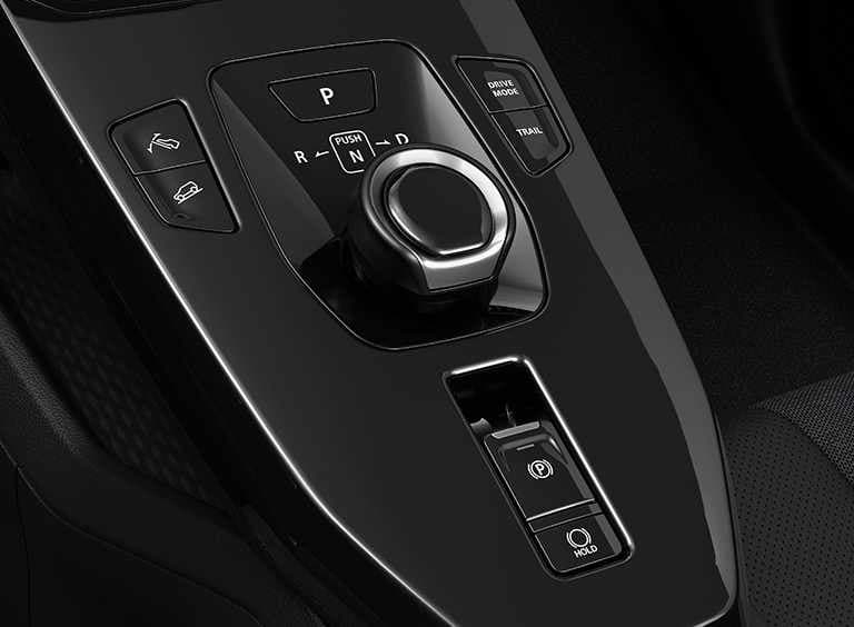 Der Wählhebel des e VITARA mit den verschiedenen einstellbaren Fahrmodi.